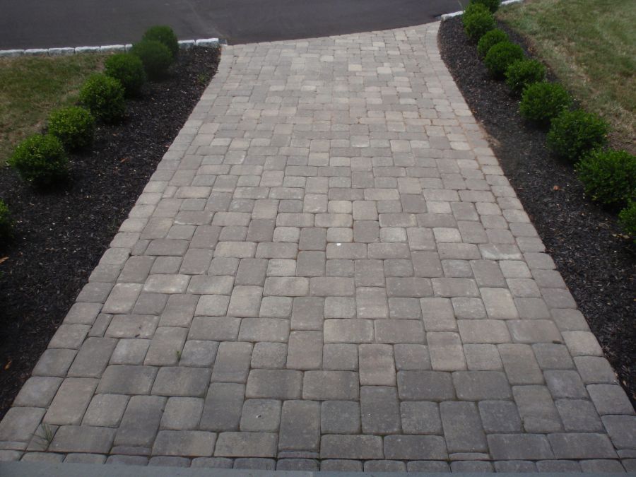 Completed paver installation adding texture and structure to a property